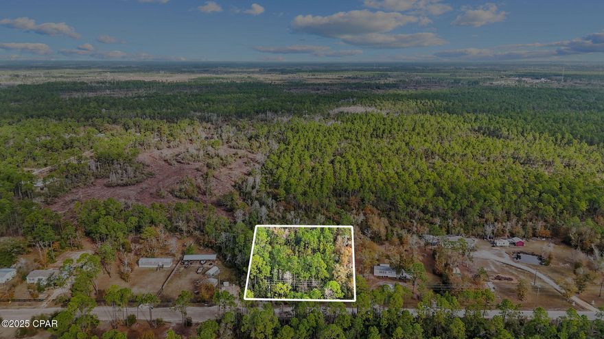 1±  Acre | R-2 Zoning | Prime Development Opportunity Near Lynn Haven, a highly desirable area. Located less than 10 minutes from Lynn Haven, this property provides the ideal balance of accessibility, growth, and future upside. The size and zoning of this parcel make it well-suited for a residential development, whether your vision includes single-family homes, duplexes, or a thoughtfully planned community (buyer to verify density and use). With ample acreage to design an efficient layout, this site presents multiple possibilities for builders and investors looking to capitalize on continued demand in the area. Conveniently positioned near shopping, schools, dining, and major roadways, this property offers both location and scale—two key ingredients for a successful development project. Large tracts with favorable zoning and close proximity to Lynn Haven are becoming increasingly scarce. Bring your plans, your team, and your vision—this is a property with real potential. Buyer to verify zoning, density, utilities, and development feasibility.