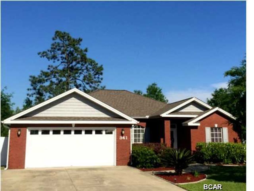 Terrific four (4) bedroom, low-maintenance, all brick home - quiet neighborhood well-located to Tyndall AFB and downtown. Entering through the glass front door you'll find an open floor plan that provides for convenient living - central to the home is the family room, dining areas and kitchen, to the left is the master bedroom suite, and to the right are the additional bedrooms (split bedroom plan). The large family room has vaulted ceilings, fireplace, crown moldings, and surround sound; the dining room (currently used as office) also has vaulted ceilings. The fully equipped kitchen includes breakfast bar, large pantry, stainless steel appliances, solid surface counter-tops, tiled back-splash; and opens directly to breakfast nook - the nook and bar provided ample seating for