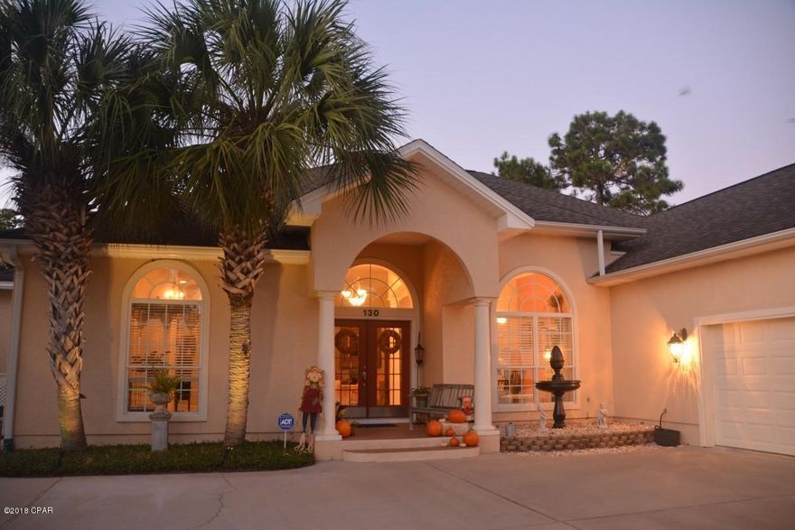 This 4 bedroom, 3 1/2 bath home is located in the beautiful Glades subdivision and located on the 13th green.Twelve and 10 foot ceilings throughout.  Two Hot water heaters, one natural gas tankless and one electric tank.  Two natural gas fireplaces with mantle.  Viking gas grill is the center point of our summer kitchen. Ceramic floors throughout the main living areas hardwood in master bedroom, carpet in guest bedrooms, granite countertops, custom cabinets and stainless steel appliances. Both bathrooms offer granite countertops, custom cabinets and tile flooring. The bedrooms are spacious and carpeted. The backyard overlooks the Hombre Golf Course. In ground pool.