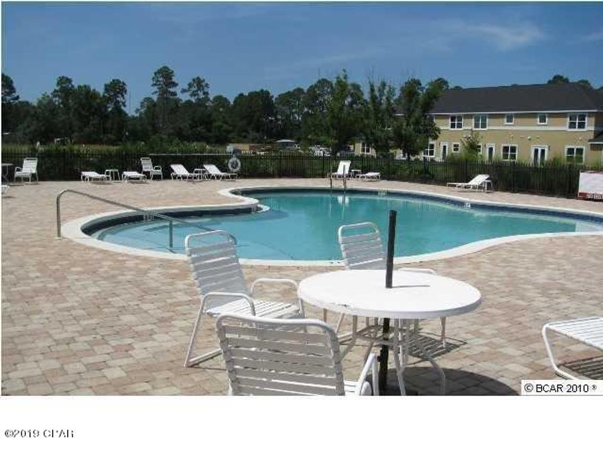 **INSURANCE INCLUDED IN HOA FEE!!** What a great Townhouse to bring your family home to! Come and enjoy this wonderful, serene newer complex located in the heart of Panama City Beach, close to town and all beach activities! This unit has 9ft ceilings on the downstairs level with washer & dryer and a half bath. Upstairs has beautiful large windows to bring so much light to the rooms! The bedrooms have spacious walk-in closets and large bath rooms. This community offers clubhouse, exercise room, and pool. Home Owner Association fee includes insurance for roof and exterior of the unit, plus common area maintenance. Come and enjoy this peaceful community of Annabella's Townhomes.  **Stock photos**