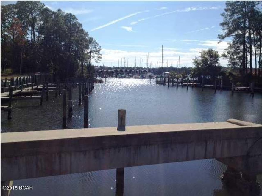 Back on the Market.  Seller says, ''Bring an Offer!'' Reduced from $1,250,000 to $795,000! PRICED TO SELL!!! +/-4.88 acres for sale on Watson Bayou at the southwest corner of E. Business Highway 98 (a/k/a U.S. Hwy. 98) and Maple Avenue. The subject property includes three parcels 22308-000-000 (the corner), 22306-000-000 (adjacent parcel to the south and submerged land lease), and 22387-000-000 (single family home at 309 Maple Ave. - no value). In addition, there is a submerged land lease with 0.91 acres). The existing marina includes 36 slips, bulk-head, seawall and boat ramp. The docks and pilings need to be repaired and/or replaced. The water depth ranges from 4' to 15' providing deep water access to Watson Bayou, St. Andrew Bay and the Gulf of Mexico. The survey, with topo, is attached The large parcels are zoned General Commercial; GC-2, and the residence at 309 Maple Ave.

is zoned Urban Residential-2. Ideal location for a new marina with a new boat barn and/or maintenance facility.