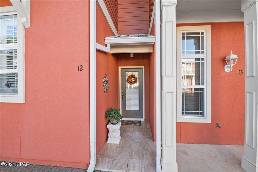 RARELY AVAILABLE CORAL BAY VILLAGE TOWNHOME...LESS THAN A 3 BLOCK GOLF CART RIDE TO THE BEACH!!! This 3bd, 2.5ba corner unit will take your breath away. Sellers have added over $32,000 in upgrades. The corner location gives the feeling of a single family home with maximum privacy. Updates include: Plantation shutters throughout home, all new kitchen appliances, new water heater, complete interior AND exterior paint, all new quartz countertops, sinks and fixtures. Seller added oak stairs, replaced old carpet with top of the line carpet in upstairs bedrooms and replaced the upstairs tub with a beautiful walk in shower. Sellers added a back patio complete with pavers and doubled the size of the side patio. Words cannot describe this townhome. Hurry and call before this one gets away!