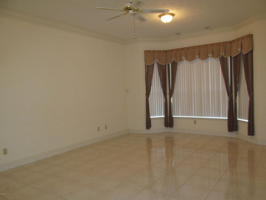 Beautiful home with screened in solar heated pool. Open living spaces and large bedrooms are just the beginning, this home boast a private hanger and access to a private runway. If you don't have a plane you can fit a large RV in this garage with 3 separate garage doors and a large hanger door in the back.