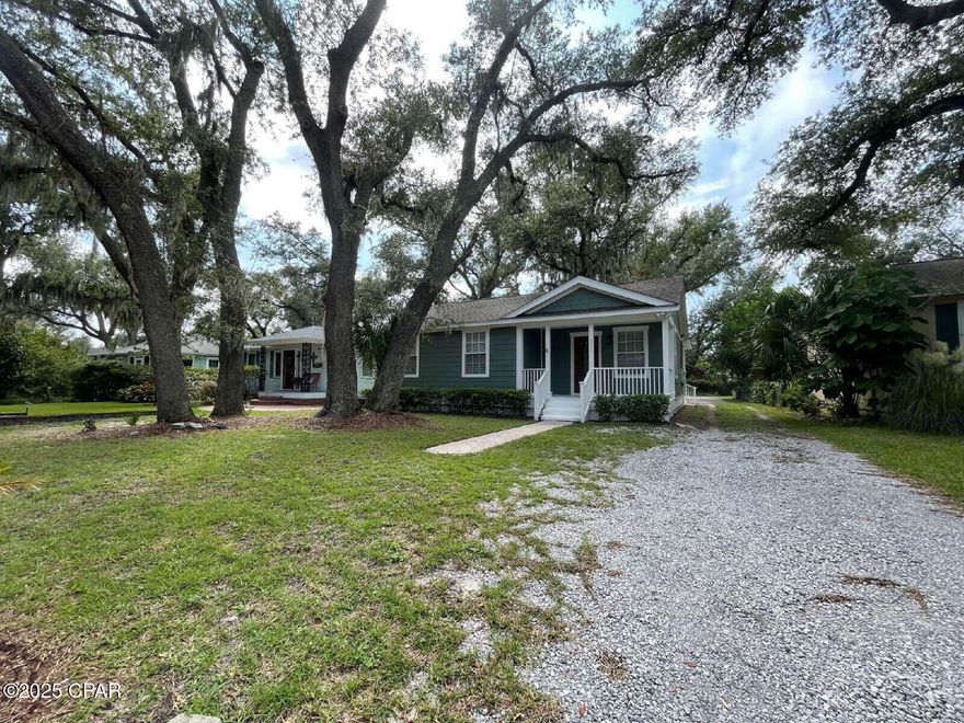 This beautiful tastefully Remodeled 3 bedroom 2 bath home located in the much desired Cove Community. This home greets you with a formal living room, lots of large windows, a beautiful lot with huge Live Oaks, and alley access. At this location you are a short walk to the St. Andrews Bay, less than a mile from the St. Andrews Bay Yacht Club, and only a mile away from Downtown Panama City. This rental includes lawn service. Please text a photo of your driver's license to our office number ending in 1673,  along with the name of the property that you are interested in and we will schedule your showing within 1 business day.  We apologize for  being cryptic about our phone number, it is likely on the web page you are viewing, but our MLS rules make this procedure LESS THAN 'user-friendly'.  Please do not fill out an application on any website until we send you the invite AFTER your showing.  Thank you.