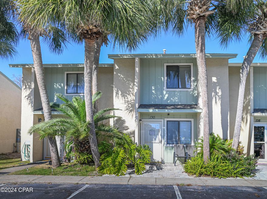 This is a fantastic and extremely rare opportunity to own a 3 bedroom townhome in a highly sought-after community. Nestled in a prime location, this beautiful townhouse features highly durable, low maintenance LVP and tile flooring, a gas stove and tastefully decorated furnishings with beach vibes throughout.  HVAC was installed in spring of 2015 and water heater at the end of 2018. 3 spacious bedrooms upstairs and a full bath. STR allowed with amazing projected ROI, particularly since it has 3 bedrooms! Two assigned parking spots are in front of the unit with additional overflow parking areas in several areas of the complex. Enjoy a beautiful day relaxing on your screened in porch.  You'll have access to a range of fantastic amenities. Enjoy a refreshing dip in one of the community pools, challenge your friends to a game of pickle ball, mini golf, tennis or shuffleboard, or take a short stroll to the pristine sandy beaches utilizing the dedicated private beach access.  Whether you're looking for a permanent residence, a vacation home, or an investment property, this is an incredible opportunity not to be missed.  You'll be hard pressed to find a complex at the beach with more reasonable HOA fees with this many amenities offered! 
HOA includes: 11 pools(5 heated), shuffleboards, beach house/café, mini golf, exercise room, pickle ball courts, dog walking station, tennis courts, playground, WIFI, cable, pest control, termite bond, trash, ground keeping, property patrol, gated community, accounting, etc