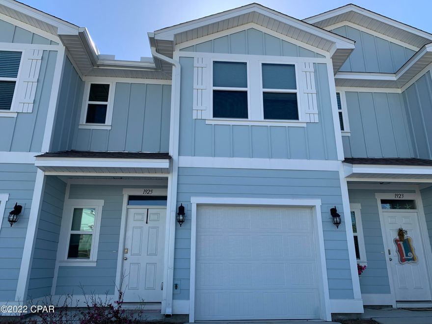 Currently Under Contract, Accepting Back-Up Offers.  Located near Hathaway Bridge, Hathaway Townhomes is minutes away from the beautiful white sand beaches and emerald green water of the Gulf.  It is a short drive to Tyndall Air Force Base, Gulf Coast State College, and Florida State University of Panama City.  From the moment you enter this townhome, you will be impressed by the beautiful interior doors with nickel hardware, vinyl plank flooring and designer lighting package.  Plush carpet is in all bedrooms. The kitchen is equipped with appliances including a refrigerator, stove, microwave and dishwasher.  Upstairs you will find 3 bedrooms with plush carpeting. Upstairs bath has granite countertops and shower/tub combo. The spacious Master bedroom has a walk-in closet and MB has a walk-in shower and double vanity with granite countertops.  This new community on Panama City Beach has sidewalks, a central post mailbox station, and a community pool and is only minutes to beaches.