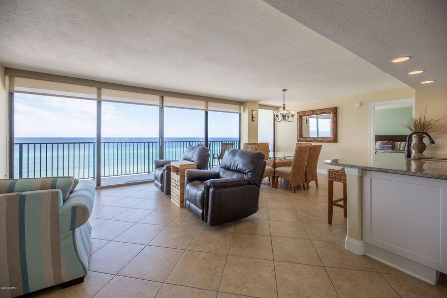Seachase is a Panama City Beach classic!  Residential units in this complex have roughly sixty feet of floor-to-ceiling glass providing incredible views of the Gulf of Mexico.  Seachase 601W has had extensive renovation and includes some floor plan changes to improve the spacious feel of this large unit.  The wall in the foyer was removed to provide a completely open feel in the living room as well as a dividing wall in the guest bedroom and the master bath.  You have to see this unit to believe it!  Split bedroom floor plan with bedrooms on each end of the unit provide privacy.  Both have en-suite bathrooms.  The living area contains a long balcony to soak up the soothing ambiance of the Gulf.
