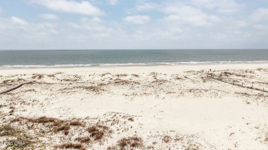 GULF-FRONT CR 30a LOT JUST UNDER 3 ACRES. Discover a rare & expansive Gulf-front homesite on the idyllic stretch of CR 30a, where coastal dreams become reality. Boasting an impressive 130' of direct Gulf frontage, this property offers endless panoramic views of shimmering emerald waters & sugar-white sands. The wide homesite provides the perfect canvas for a custom beach retreat—whether it's a light-filled vacation escape or your forever home designed to capture every ocean breeze & sunset. Surrounded by untouched natural beauty, this property blends privacy with authentic coastal charm. Majestic live oaks, salt-kissed breezes & lush native vegetation create a peaceful, secluded atmosphere that's hard to find. You'll enjoy a community kayak dock, placing open-water adventures right at your doorstep. Paddle into the peaceful channels, glide past marshlands, or launch for a scenic tour any time you like. The site also supports modern build-accessibility with public sewer & water available and is positioned for FEMA flood-insurance eligibility, adding practicality to your coastal vision. The setting couldn't be better: the pet-friendly beaches let you stroll with your four-legged friend at your side & as the sun dips low, you might choose to fish from your backyard, build a bonfire in the sand, or simply sink into seaside relaxation. Plus, convenient beach driving access with your permitted vehicle just at the end of the road.  Imagine your future: morning coffee on a wide deck watching the waves, afternoon paddles through nature's palette, evening bonfires under star-filled skies & year-round access to life on the coast without compromise. This is more than a lot—it's a blank canvas, front row to the Gulf, awaiting your coastal lifestyle. Don't miss this exceptional opportunity! Call for your private tour & LIVE THE BEACH LIFE!