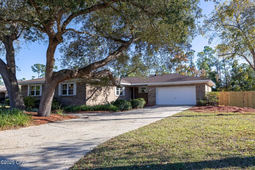 Beautiful Brick Ranch in a Desirable Neighborhood, convenient to shopping, hospitals, Lynn Haven, Historic Panama City and the beautiful white sandy beaches of Panama City Beach. Large home with 3 bedrooms and 2 Baths.  New large back deck, new fencing, new inside paint and all new double pane hurricane resistant windows throughout the home. The home has  solar panels with Solar Photovoltaic electric system. Also a solar hot water heater. Solar panels installed 2019.  Solar panels are paid off. This home has beautiful Oak trees in the front yard, recently trimmed. THIS HOME IS A MUST SEE....CALL YOUR REALTOR TODAY.