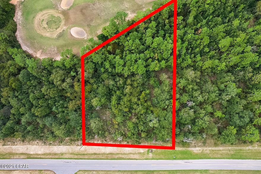 Buildable lot in the developing Sunny HIlls, Unit 6. Lot sits on Sunny HIlls golf course, hole 11. No mobile homes allowed. No HOA fees.