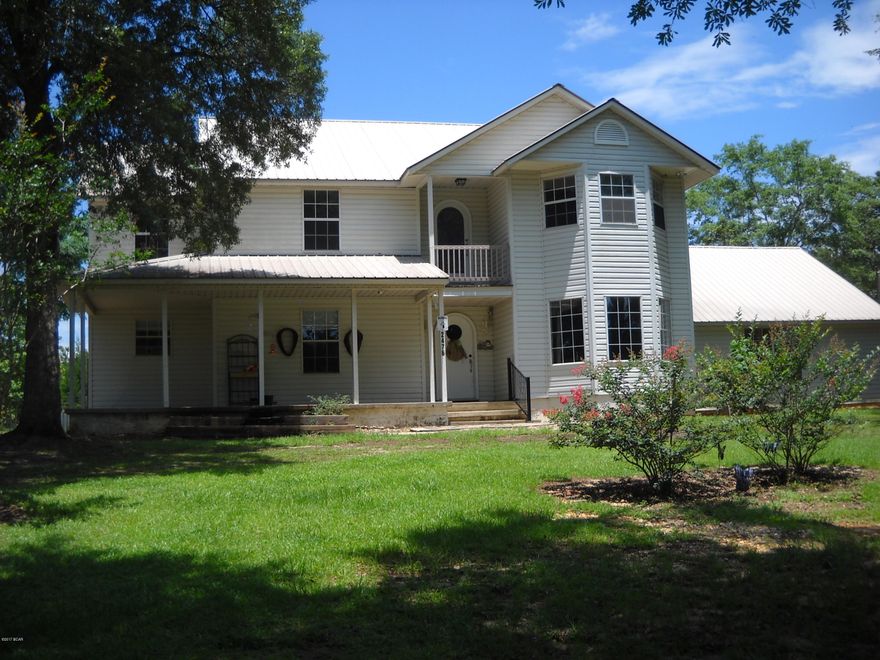 Beautiful 2 story home seated atop  almost 27 ACRES, at the end of a Private Lane for privacy, yet easy access to Marianna's West interstate ramp. This home has a Fenced, IN GROUND POOL, 3 Bed rooms with a large bonus room, Attached spacious 2 car garage, and a concrete floor pole barn.    Current owners have made improvements that are too numerous to list, including 2 NEW CENTRAL HVAC UNITS, BLACK STAINLESS STEEL REFRIGERATOR, and many more. Call and schedule your appointment today.