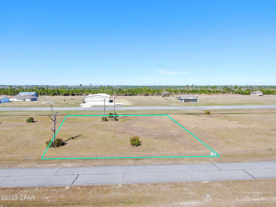 'CURRENTLY UNDER CONTRACT, SELLER ACCEPTING BACKUP OFFERS' 



A PILOT'S REVERIE! Have you ever dreamed of owning a custom home with a private airplane hangar right on the side of a 3,200 ft, well lit and paved, runway? If so, this is your chance to build just that! This near acre lot is located inside of a gated community and the hoa maintains all of the common areas for less than $600/year. Your dream home will be located right in the middle of Panama City Beach & Mexico Beach, 15 minutes to restaurants & shopping, and 20 minutes to Tyndall AFB. It doesn't get better than that! Please call listing agent for the gate code.
