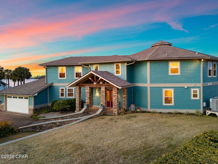 Florida Living at its BEST!!  Breathtaking water views, gorgeous Sunsets, A Boater's Dream. Enjoy Waterfront Living, and make friends with local wildlife!! This one-of-a-kind 4 bedroom, 4.5 bath home offers 2 master suites; one on the main level. Each bedroom has its own dedicated bath. The extra large wrap around Loft has 2 Balconies overlooking the Water. The kitchen is a chef's delight, featuring an induction cooktop and double convection ovens and walk-in Pantry. Two main living areas offer lots of options. Hidden Saferoom under the stairs. The home features Loads of Storage. But the real attraction is the outdoor space: a Private Pool with spacious deck & Gazebo, a Boat House with 2 Boat Lifts, Fish Cleaning Station, and an Observation Tower! Sunset Lane is a Peninsula  - Come claim your own Private Oasis!