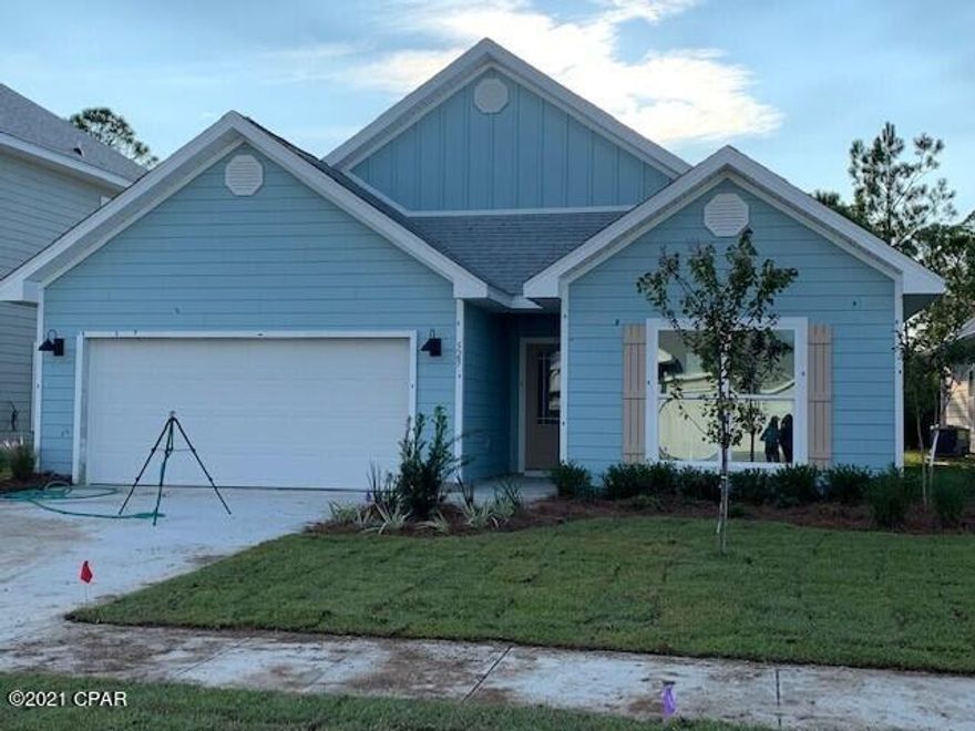 Welcome to Emerald Cove! This up and coming community is conveniently located on the East end of Panama City Beach. Living here would mean that you are just a few short minutes from having your toes in the white sand of our beautiful Emerald Coast. The Delray plan features 4 bedrooms, with two just off the foyer and an additional bedroom that could be used as an office or study. The kitchen is open to the large great room and has a center island with granite cabinetry, and stainless-steel appliances. Bedroom 1 has his and hers walk-in closets and a bath with dual vanity sinks and fiberglass tub with a separate shower – per plan. Additional features include LVP flooring throughout the home, carpet in all bedrooms, brushed nickel hardware on the interior doors, and quality paint on walls. Pictures may be of similar, but not necessarily of subject property, including exterior and interior colors.

This home comes standard with a Smart Home Technology package which includes a KwikSet keyless entry, Skybell doorbell, automated front porch lighting, an Echo Dot device, and Quolsys touch panel which can be integrated to control your lighting, thermostat, front door and so much more. A builder 10-year structural warranty is also included.

This home is being constructed with the Zip Sheathing system, providing greater protection than a traditional housewrap from damages due to wind, rain, and extreme weather.