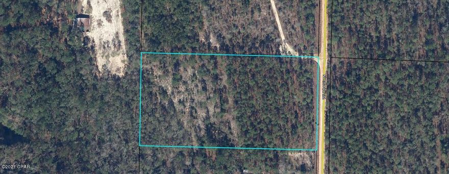 Spacious 5 acre tract high on the hill (a/k/a small mountain) south of Wausau and north of Sunny Hills.  This tract is fairly private since Wild Rose Lane is a short dead end road with a only few neighbors.   Property is wooded with pines but could be easily cleared.  Site built homes, manufactured homes and horses ok.  Convenient location to Chipley and Panama City.​​‌​​​​‌​‌​​​​‌​​‌​​​​‌‌ Broker/Owner.