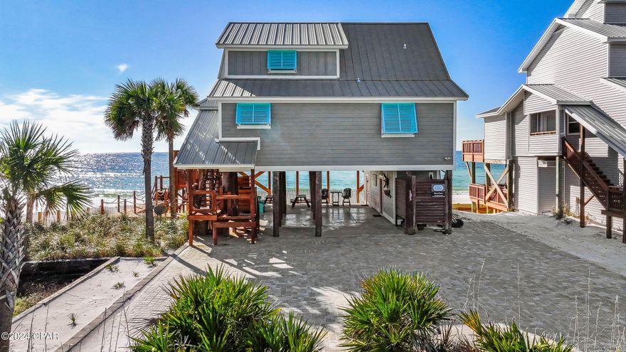 CURRENTLY UNDER CONTRACT, SELLER WILL CONSIDER BACKUP OFFERS. THIS SEASIDE RETREAT INCLUDES A RARE FIND OF 130 FEET OF GULF FRONT! This 4-bedroom, 3-1/2 bathroom is just steps away from the pristine, sugar-white sands of Cape San Blas. Designed with an open-concept layout, the home offers a seamless flow that's perfect for both relaxation and entertaining. The living room features elevated two-story plank ceilings, flooding the space with natural light from the wall of windows and creating an inviting atmosphere. The kitchen is light, bright, and spacious, with beautiful granite countertops, premium stainless-steel appliances, ample cabinetry, a beverage refrigerator, and complete with breakfast bar seating. Step outside onto the expansive deck to enjoy breathtaking views and the invigorating Gulf breeze. The first floor features a primary suite with an ensuite bath, direct access to the gulf view sitting area, and perfect for savoring your morning coffee while watching the sunrise. This level also includes a half bath and an additional guest bedroom with its own private ensuite. On the upper level, you'll discover a serene retreat featuring a king suite with its own private balcony, accompanied by an additional guest bedroom. When you step outside, the home offers a private outdoor shower with hot and cold water, perfect for rinsing off the sun, salt, and sand after a relaxing day at the beach. With panoramic views, direct beach access, and proximity to the 8-mile Walk/Bike Path, this home provides the perfect coastal escape. This home is conveniently located near the local shops, perfect for a bike ride or walk for fresh donuts or a sweet treat. Don't miss out on the opportunity to own a piece of paradise in one of Florida's most sought-after beach destinations. Explore the property virtually with the 3D tour and schedule your private showing today!
