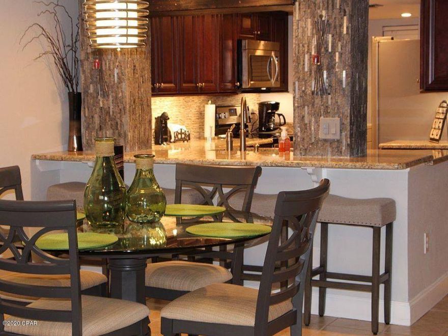 This is a rare opportunity to purchase 2 two story unit in the much desired Moonspinner Apartments Condominium. You can walk to the beautiful St Andrews State Park where you can fish,scuba dive and swim. There are several fine restaurants on Thomas Drive. The unit has a balconies one on the third level and one on the fourth level. This unit has been completely updated. the complex features 24 hour gated security, heated pool, kiddie pool, hot tub,lighted tennis court,basketball court,shuffleboard court, free telephone service,free wifi, cable TV including HBO, exercise room, on site maintenance, meeting room, business center, beach chair and canopy rental available (in season). All information is believed to be correct but should be verified by the buyer.