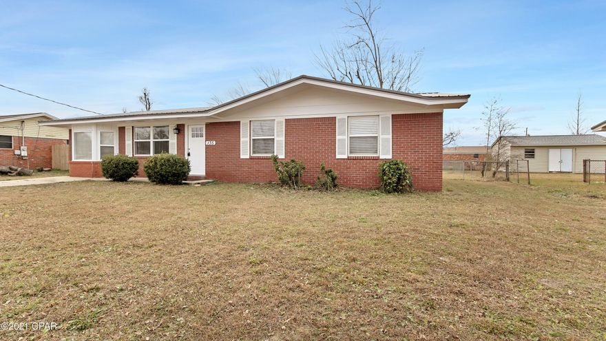 CURRENTLY UNDER CONTRACT, SELLER ACCEPTING BACKUP OFFERS Newly remodeled home minutes to Tyndall Air Force base!  This home is like new & features a new metal roof, water heater, flooring, & more! As you walk in you'll love the barn wood style luxury laminate flooring, large living room & open floor plan. The kitchen over looks the living room & features newer appliances, breakfast bar & pantry. Off the kitchen is a dining area & second family room! You'll love the spacious inside laundry room & extra storage in this house! The master bedroom is spacious & boasts an on-suite bathroom.  Enjoy your morning coffee in the Florida room over looking the gigantic, fully fenced back yard. Plenty of room for a pool, play set, or just space to run for your pets. Everyone will love the shade trees!