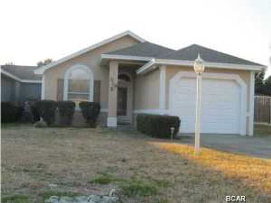 This is a very nice 2 bedroom 2 bath home that offers a one car garage, sprinkler system that is on well water so no cost to you. There is a fireplace in the living area- however its not connected- (gas). There are built in shelves in the living area. The master bath has a large walk in closet. The home also comes with a full size washer and dryer that comes ''AS IS'' NO WARRANTY. There is also an enclosed patio off the living area that leads to the large deck, the back part of the deck is covered. The home is also on septic.