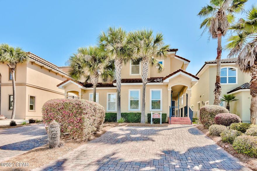 Incredible fully furnished 3-bedroom, 3-bath townhome located in the beautiful  Mediterranean gated community of La Valencia just across the street from the Gulf of Mexico on the desirable west end of Panama City Beach. This home offers a spacious, open floor plan boasting 1,615 sq ft! The interior features beautiful tile floors in the common areas, 12 ft ceilings, crown molding, and recessed lighting. The living has direct access to a large back patio, ideal for outdoor dining & grilling. The open kitchen features custom tile backsplash, granite countertops, ample cabinets, and black appliances. The open dining area is just off the kitchen making entertaining easy. The ground level offers a spacious guest bedroom and bathroom, convenient for guests. The spacious master bedroom is on the second level and features direct access to a private balcony, king bed, and en-suite bathroom. The master bath features a large walk-in closet, double vanity, walk-in shower, and a large Whirlpool tub with tile surround. The second level also offers an additional guest bedroom with direct balcony access, two twin beds, a sitting area, and an en-suite bathroom. The side balcony can be accessed from the landing at the top of the stairs as well as the guest bedroom. 

Not only do you have a deeded beach access for the community but also a Gulf front pool to enjoy while at the beach. When you are hanging out by the house there is an additional pool, hot tub and clubhouse with a fitness room on the north side as well as tennis courts. The curb appeal is exceptional with tropical landscaping and a paver stone driveway. The subdivision is nicely maintained by the HOA and is a great community. Prime location on the west end of Panama City Beach close to Pier Park and prestigious communities of 30A (just under 6 miles away). Enjoy beach living and the coastal lifestyle everyone desires!