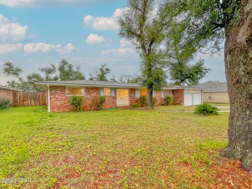 Don't miss this spacious and beautifully renovated all brick 4 bedroom home on over half an acre! Stepping into this home, you will notice tons of natural lighting and sliding glass doors that lead out to the large screened in back porch which overlooks this home's huge privacy fenced back yard. If you love to entertain, this home has the space you need! The open kitchen features all stainless appliances and gleaming granite countertops with plenty of room to prepare meals to serve family and friends. On this side of the home we have one of the bedrooms which would also serve well as a bonus room, office, storage, play room, or hobby room! This home also features a sizeable laundry room with ample cabinet space for storage and a 2 car garage with large additional storage room inside for all of your extras. On the opposite end of the home, we have the additional 3 bedrooms and beautifully renovated bathrooms. This home truly has everything a young family needs! Plenty of room for a pool or any other extras you would like! Close to the water, Tyndall Air Force Base, and so much more. All measurements approximate- buyer to verify if important.