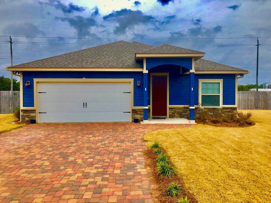 West End of Panama City Beach. This beautiful 4 Bedroom, 2.5 Bath Newer Home features 9/10 Foot Ceilings, 20 inch Porcelain Tile Flooring throughout Main Living Area and Bathrooms. The Kitchen has Custom All Wood Cabinets with Soft-Close Doors and Drawers, Granite Counter Tops with under Mount Sinks, Breakfast Island and Whirlpool Stainless Appliances. Some of the Standard Features include: Tremendous Master Walk-In ''Step Down'' Shower with 2 Shower Heads, 8ft Interior Doors, Crown Molding, Paver Driveways, Upgraded Carpet and Pad, 14 SEER Heat Pumps, Anderson LOW E Double Paned Windows, Radiant Barrier Roof Decking (Reflects Heat Away), and Underground Utilities. Put this wonderful New Home at the Top More...