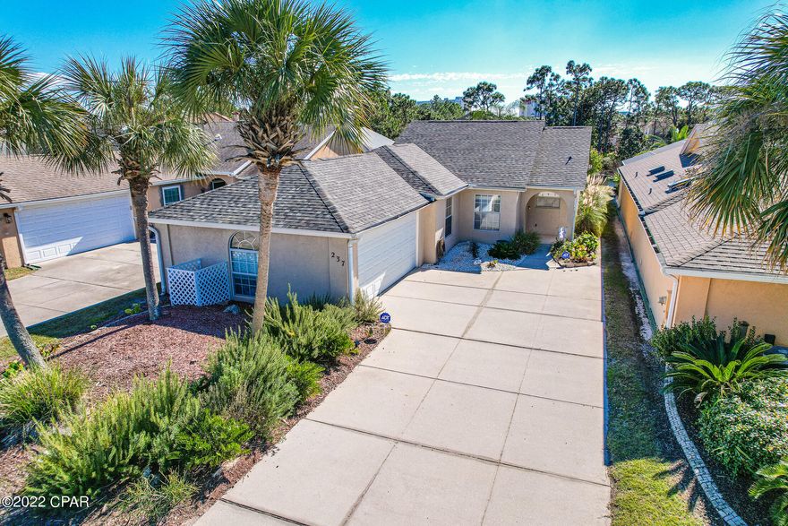 This 3 Bedroom W/ 2 Full Bathroom Florida Home Located In The Glades Is Immaculate & Full Of Upgrades! Enjoy The Open Floor Plan W/ Large Windows Throughout. The Beautiful Kitchen Is The Heart Of The Home Complete With Quartz Countertops & Stainless Steel Appliances. This Floorplan Includes A Split Layout Between the Guest Bedrooms And Master. Large Extended Patio For Entertaining Right Off The Dining Area. The Large Master Bedroom W/ Large Walk In Shower, Double Sinks. Enjoy The Backyard Right On A Pond. The 2 Car  Garage Allows Room For Extra Storage. This Home Is Perfect For A New Family! This Won't Last Long!