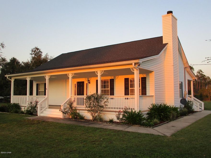 Pristine 2br/1.5ba home on 2 beautiful acres in quiet neighborhood near Deer Point Lake in Southport, FL. Clean, like new home with large porches front and back, has a lovely open floor plan with many windows for lots of  natural light. The open kitchen/living area has custom cabinets and plenty of countertop space, with a separate  laundry room off the kitchen. The immaculate living area has solid oak flooring and includes a cozy wood burning fireplace.

This home has a CLEAN look inside and out! All 2 acres are fenced in, chain link, the 2 car detached garage has spacious floored storage above, and the additional carport has an attached workshop and/or storage area. 

Lovely, well built and well taken care of, move in ready home. Plenty of room to grow, or to be just Home Sweet Home!