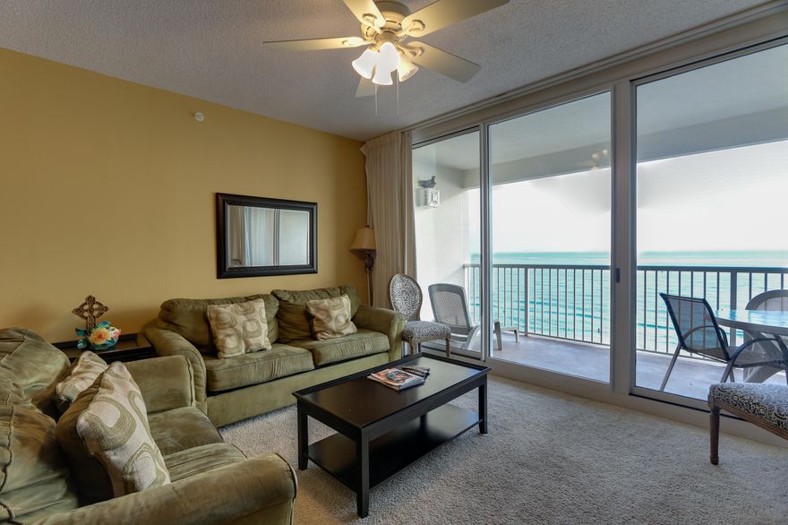 The beach getaway you have always dreamed of - a beach inspired 2/2 Gulf front condo at Majestic Beach Towers. Riveting Gulf views are framed by beachy chic interiors, designed with the Gulf of Mexico and sun in mind. Sunshine and warm gulf breezes abound from the balcony, with amazing water and beach views. The gourmet kitchen features loads of cabinet space and is fully stocked and rental ready and the rest of the condo lives larger than its square footage and is spacious and bright. Enjoy the good life at Majestic Beach Resort with resort style amenities including in/out pools, tennis, a large outdoor dining area, impressive fitness facility, community room, the Majestic Movie Theatre, the H20 Bar and Grill serving Gulfside lunch and dinner and

Majestic Market featuring Starbucks coffe and gourmet sandwiches, etc. This is the ultimate vacation destination! Quick distance to the wonderful shopping, dining and entertainment at Pier Park and the airport.