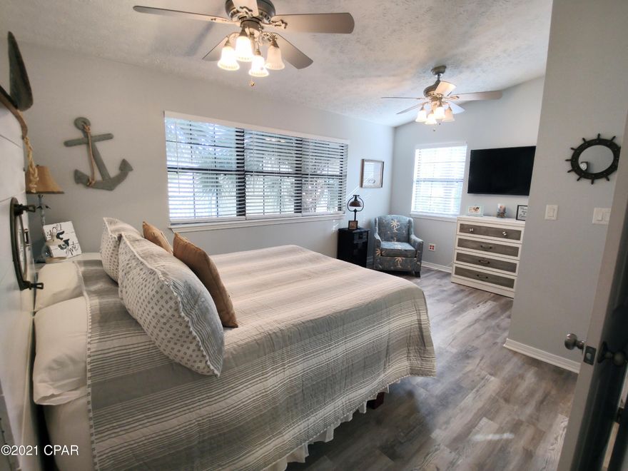 'CURRENTLY UNDER CONTRACT, SELLER ACCEPTING BACKUP OFFERS'... UPDATED UNIT. This is a perfect BEACH HOUSE GETAWAY in a GATED COMMUNITY and only a short STROLL to the BEACH. This unit can be either a 3 or 4 Bedroom, you can use the DOWNSTAIRS EXTENSION as a BEDROOM or a Family Room, there is also a Shower off of this Bedroom/Family Room. This is an END UNIT with EXTRA PARKING located across from the FITNESS ROOM. This would be an excellent SECOND HOME or RENTAL UNIT. There are a lot of AMMENITIES in this RESORT. 11 Pools, 4 Tennis Courts, Shuffleboard Courts, 18 Hole Mini Golf, Conference Center, PLUS a Beach House with a Snack Bar and a Pool that are Gulf Front. This RESORT is WALKING DISTANCE to The Beach, Dining, Shopping, Arcade, Walmart, Publix, and the Post Office.  Age, SF Approx.