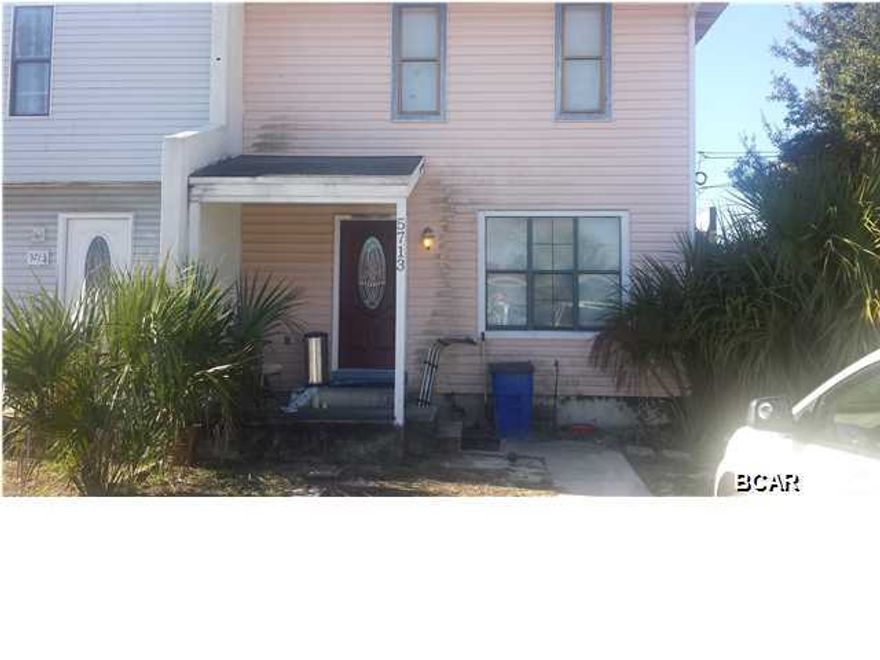 This 3 bedroom 1.5 bath townhome is in an excellent location and only 2 blocks away from the sugar white sands on the world's most beautiful beaches. From the upstairs master bedroom you can even catch a glimpse of the gulf on the homes private 2nd story deck. The home is in need of some work both inside and out. This property will need updating and some remodeling and the price reflects this fact. Septic will need to be replaced or hooked to City Sewer. It has a great deal of potential so bring all offers and as always all information taken from public sources are deemed to be accurate, yet not guaranteed. Accepting Back up offers