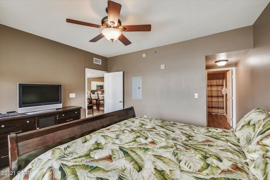 Beautifully furnished luxurious 18th floor unit at the Shores of Panama Resort with incredible view of both Gulf of Mexico and the spectacular resort lagoon pool. Popular ''C'' floor plan Master Bedroom with Gulf view + Bunk room and two full bathrooms.  Perfect vacation rental opportunity, completely updated in 2021 with a vinyl plank floor. Conveniently located Dedicated parking space on the same floor. A large private balcony is furnished with seating and offers a breathtaking view of the Gulf of Mexico



Shores of Panama, is a 23 story Tuscany style condominium of gulf front luxury accommodations offering unparalleled amenities including almost 500' of Gulf frontage, 13,966 sq. ft. million dollar Gulfside, zero entry lagoon-style gulf side pool, Gulf side hot tub, Large heated indoor pool & hot tub, Covered on-site parking deck, Health center with fitness equipment, Two tiki bars serving lunch and dinner, Beach activities and rental services, Free high-speed internet access,  and more, surrounded by beautiful exterior details. The Shores of Panama is an excellent location on the beach next to Pineapple Willy's and is within walking distance of other restaurants and entertainment. Like thousands of visitors each year, your family will LOVE Shores of Panama.