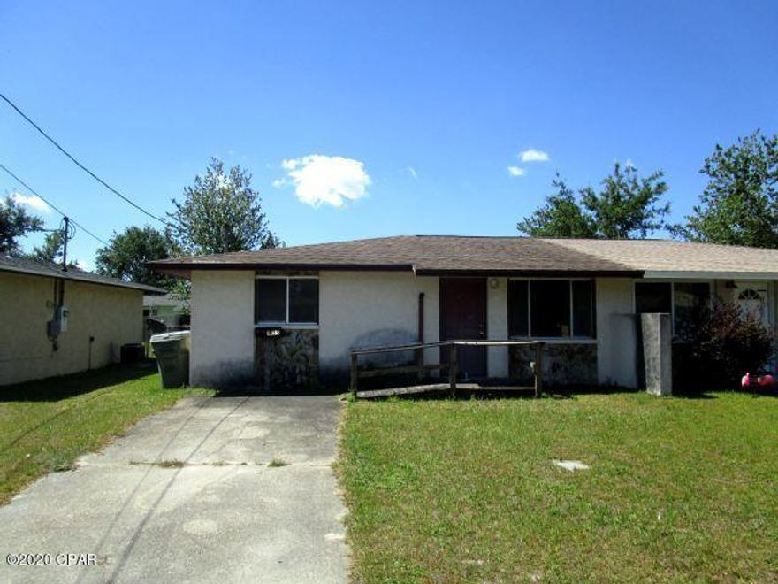 DUPLEX LOCATED IN THE HEART OF LYNN HAVEN!  This unit features a living room that is off of the galley-style kitchen, which has direct access to the large, fenced backyard and storage room.  The two bedrooms are a good size with the full bath conveniently located between the two.  The laundry closet is located in the hall and can handle a full-size washer and dryer.  The unit is being sold in its AS IS condition.