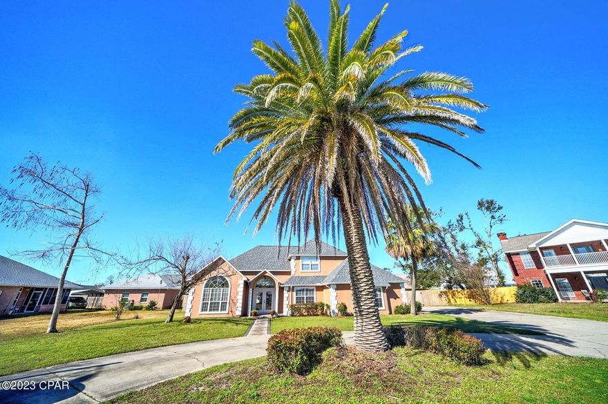 CURRENTLY UNDER CONTRACT, SELLER WILL CONSIDER BACKUP OFFERS || Spacious and unique 5 bedroom, 3 bathroom home with a pool, circular driveway and entryway. This home has a 2019 roof, recently replaced HVAC, and a 2021 HWH. This home welcomes you with a large foyer with vaulted ceilings. There is a formal sitting room or office and formal dining room at the front of the home. The formal dining room can also be used as a bedroom. The large living room has a gas fireplace, vaulted ceilings and recessed lighting. The eat-in kitchen is equipped with stainless appliances, granite counter tops, tile backsplash, updated lighting, an island with a sink, plenty of cabinet space, a wine rack, a large pantry, and LED lighting under the cabinets. The primary suite is located on the first floor for plenty of privacy. The private primary bathroom has a large, custom tiled shower, double vanity, a linen closet, and a walk-in closet. The bonus room is located downstairs off the side entrance. The bonus room houses a wet bar equipped with a sink and mini fridge. This room is very large and could be used for many purposes. The two guest bedrooms are upstairs and each have a walk-in closet. Each upstairs bedroom has a private vanity and shares a Jack and Jill style washroom with a newly tiled shower/tub combo. There is also an upstairs loft area that is perfect for a study nook or play area. This home has had many updates including a recent roof, privacy fence, lighting fixtures, and tile backsplash in the kitchen. The sheetrock is textured with bull nose finishes. The backyard is a Tropical Oasis featuring a gunite concrete in-ground pool with a large pool house. There is also a gazebo with a swing in the backyard that is perfect for enjoying sunsets and spending time with the family.