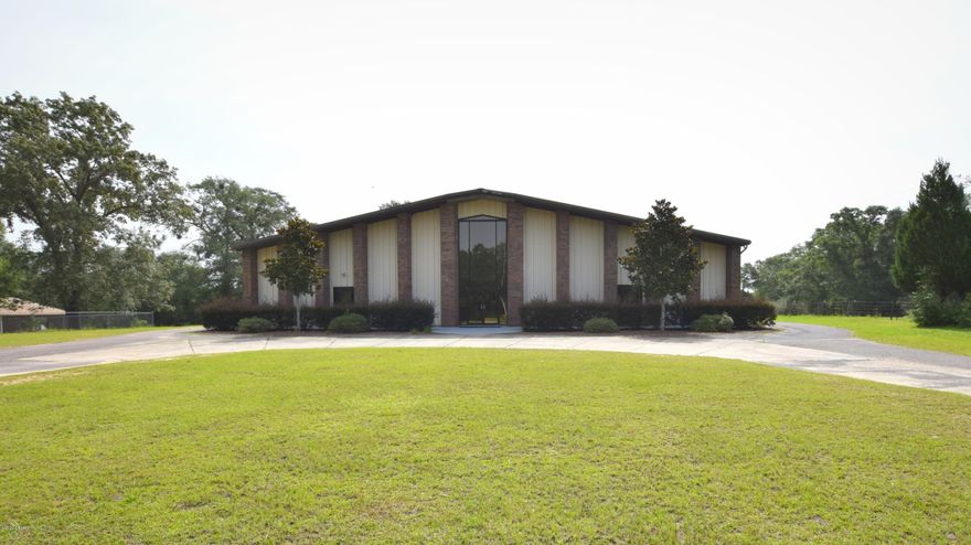 This 15,000+ sqft steel building is currently being used as a church and features over 11 office spaces, massive cafeteria, large sanctuary, his/hers baths with showers and unfinished space that could be converted to addional offices or used as storage. The detached 3-bedroom 2 bath parsonage measures over 2100 sq ft and provides a place for the church staff to relax and call home. This rare find is located off Hwy 177A just north of Hwy 2.