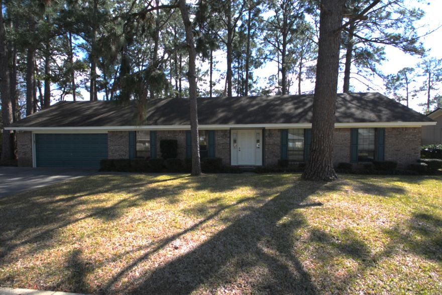 OPEN HOUSE - Sunday 2 - 4. This VERY well maintained 3 bedroom 2 bath home in a great neighborhood with sidewalks and very limited traffic is a must see.  The home features plenty of room in the front and back yard for kids to play. This one owner home is move in ready.  All of the exterior has been recently repainted and the AC unit is just 3 years old.  All HVAC duct work was resealed and sized when the new unit was installed. A separate laundry room and private office were recently added to the home.  The large fenced back yard also includes a private garden completely surrounded by a beautiful ivy covered fence while leaving plenty of room for a pool and boat parking.  The home is just minutes from schools, shopping and restaurants.  Schedule your showing today. Owner's Notes:  Flood Zone X
All brick exterior
Double paned windows, long windows recently replaced
New High Efficiency Heat Pump (2013)
New sealed duct work in attic (2013) 
Ceramic tile & engineered wood all floors 
Wired for phone, cable and Internet
Wood burning, all brick fireplace in family room w/ash pit
Extra pantry in laundry & kitchen
Oversize two-car garage large enough for 2 SUV's
Peg board on walls in garage 
Stand up attic w /pull-down stairs 
Front yard sprinkler & back yard faucet on irrigation meter 
Yard fenced with stockade fence new 2013 & 2014)
Close to grocery stores, Wal-Mart and PC mall
Pump was installed in the back yard to prevent standing water in the back yard in times of extreme rainfall.  The yard has never flooded but the standing water during some of the extreme rain events causes a loss of turf. Hence the pump and associated French drains.