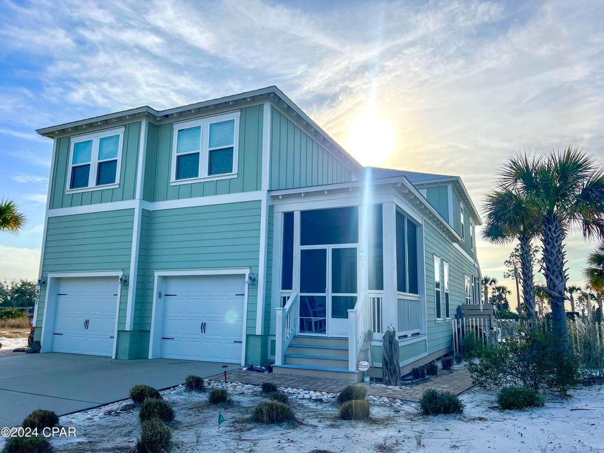 Immerse yourself in turnkey luxury with unobstructed views and glorious sunsets sinking into the waters of the Gulf of Mexico and St Joseph's Bay. Located in the coveted Windmark Beach Community, this beautifully decorated home is truly a rare find. Unlike most beach homes, this property has never been rented and has been the homestead residence for the owner since purchasing new in 2019. Larger than most of the surrounding homes and boasting bedrooms and baths with over 3000 sq ft of well design space that is complemented with screened front and back porches as well as master suite covered balcony that affords year round breathtaking sunsets. A large xeriscape gulf view backyard is complete with a pool, volleyball court, and generous lounge space that is all secured by a polished aluminum parameter fence. FIRST LEVEL- Main entry with screened porch, double garage with private entry, powder room with granite topped vanity, nice sized foyer with 2nd level access, dining room with water views, large kitchen with; stainless Frigidaire Appliances; gas range, electric oven, microwave, dishwasher, large refrigerator, double sink w/ disposal, subway tile backsplash, granite countertops, large island bar with granite top, walk-in pantry. A large great room with gulf and pool views gives way to an expansive screened in porch. 2ND LEVEL consists of a massive master suite with En suite (double vanity granite countertops, garden tub, separate shower), gulf view sitting area, private covered balcony, ship lap accents, and walk-in closet. Additional bedroom with En suite and walk-in closet as well as two other bedrooms that share a full bath, spacious laundry/ utility room with storage rounds out the second level. Whether entertaining friends and family or looking for an investment opportunity with outstanding income potential, this is a must-see property. All dimensions obtained from the original house plan or GulfPA. Owner modified the gulf view master sitting area.