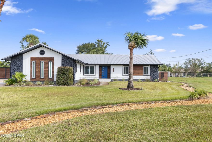 Completely remodeled 3 bedroom, 2 bath home on a large 200x150 lot in a quiet Panama City neighborhood. The kitchen features fantasy brown leather granite countertops, crown valence cabinets with lighting, and new Samsung and KitchenAid appliances. Updates include all new lighting fixtures, Pergo, tile, and Mohawk RevWood floors with LVP from Sherwin Williams. Double pane windows, updated electrical and plumbing, and a new 2025 hot water heater provide peace of mind. The master suite includes a custom closet with LED lighting, outlets, and built-in system, plus a Toto Washlet bidet. Outdoor features include a saltwater pool with a 2025 repainted deck, solar fence lighting, and irrigation that runs off a well. The property is enclosed by an 8-foot horizontal double-board privacy fence with a 14-foot double gate. Graded and rocked RV and boat parking areas are fitted with 110V and 230V/50 amp service, with additional parking available. Detached workshop garage includes full perimeter and overhead receptacles, 230V power, and WiFi-controlled lighting. A 60 sq ft detached shed and a paid-in-full home water softener complete the property. Conveniently located near shopping and entertainment, including the new Publix and Starbucks. Call for a private tour or reach out for the media file.