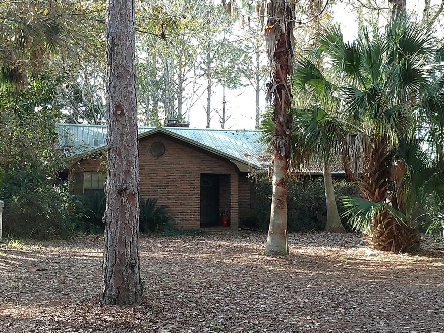 Single-family waterfront home on Laird Bayou. The home features a Florida room, detached double garage and is on well and septic. 



All measurements are approximate.
