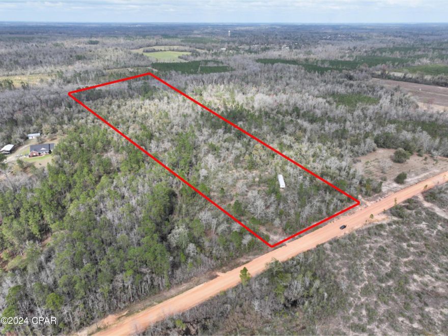 16 wooded acres with 530 ft of road frontage!  The land is high and dry with electric available at the road!  A perfect home site or recreational tract outside of city limits.