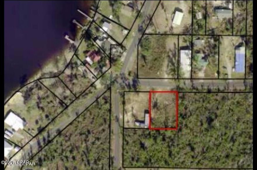 Discover the peace and charm of country living with scenic neighborhood views of Deerpoint Lake. This vacant lot in the desirable Bay Head community offers the perfect opportunity to build your dream home. Conveniently located just half a mile from a public boat ramp and picnic area, you'll enjoy easy access to outdoor recreation and waterfront activities.

The property includes existing septic, well, and electrical access (condition and functionality unknown), providing a head start for future development. Currently zoned R-1 for single-family residential use, this lot is ready for your vision to come to life.