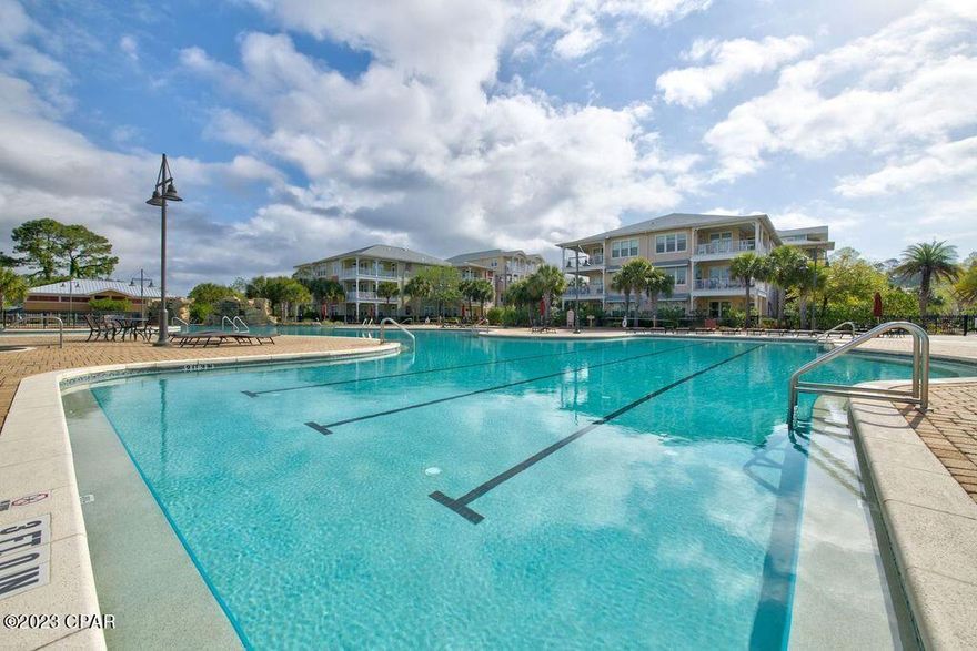 CURRENTLY UNDER CONTRACT, SELLER WILL CONSIDER BACKUP OFFERS! Come join the Island Reserve Lifestyle!!! Private Gated Community with NO short-term rentals allowed. This Immaculate Well Maintained  2BR / 2.5BA Condo offers the perfect way to enjoy a complete resort environment without the rush of vacationers checking in and out on a regular basis. Vacant and east to show! This unit features; Stainless-Steel Kitchen Appliances, Granite Counter tops, Ceramic Tile and Luxury Plank Vinyl Flooring throughout! The Master Bedroom has an ensuite Bathroom that includes a Garden Tub and sperate Stand Alone Shower. It is also located with convenient parking just steps from your door. You also can't beat the Amenities at this Gorgeous Complex!!! Enjoy the Resort style pool, with waterfall and splash pad, hot tub, fitness center, community room, indoor pickle ball/basketball court & theater room! Come see for yourself all Island Reserve has to offer! All dimensions are approximate and should be verified if important.