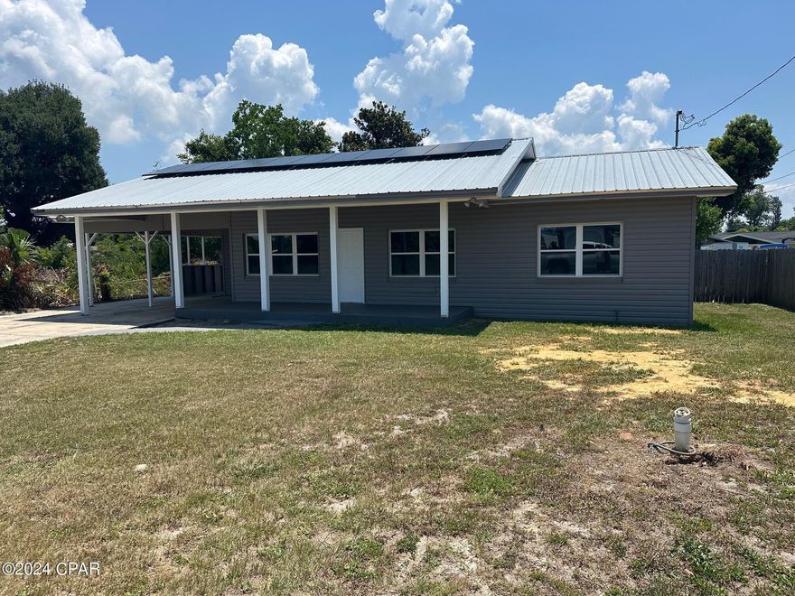 Totally updated home in established neighborhood.  Updated electrical, HVAC, and plumbing.  All new insulation, flooring and windows. Roof with solar panels, new LG appliances, open kitchen and dining area and updated bathroom. Plus detached 16x20 garage in fenced back yard and dual carports. This won't last long!