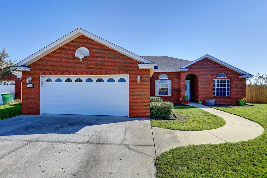 Meticulously maintained home in Cedar's Crossing!  This beautiful 3 bedroom 2 bathroom home has an open split floor plan.  The master bedroom is large and the master bath features double vanities, a garden tub, separate shower, & walk-in closet.  The eat-in kitchen features a breakfast bar, over-sized sink, and a custom built storage bench in the bay window.  The kitchen is open to the living room with a lovely mantle and electric fireplace.  Exterior features of this home include a two car garage, sprinklers in front & back yards, & views of the pond just behind the house.  This house has a new roof, new siding, new A/C with 10-year warranty, new garage door with warranty, new fence, & has hurricane shutters. *All sizes are approximate & should be verified if important.