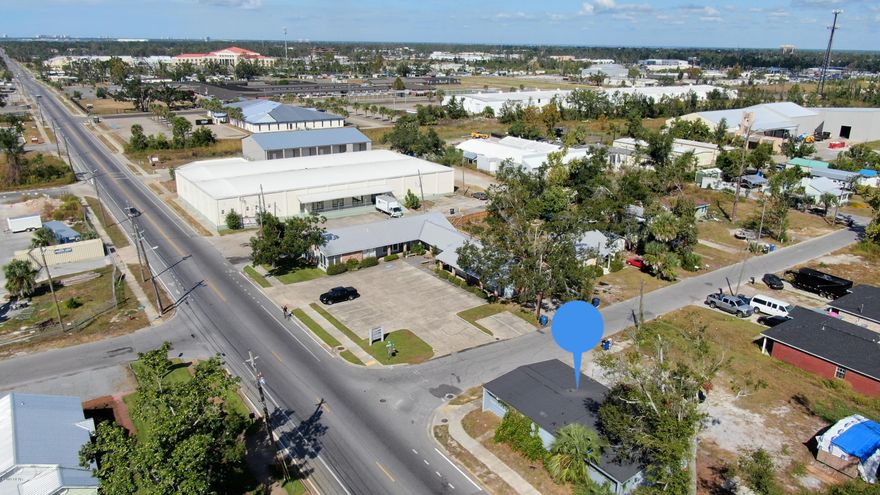 This is an excellent opportunity for a commercial location. Property can be used for many purposes. Make it what you need. Close to everything. Corner lot, with great parking. 

All measurements are approx, please verify if important.