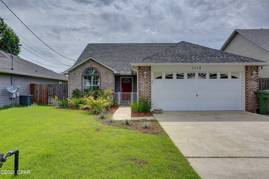 This 3 bed 2 bath brick and vinyl home in Lynn Haven is just a gem!  Highlights include eat in kitchen, stainless appliances, laminate floors throughout main living areas and master, granite countertops, interior laundry room (washer and dryer convey with home), gas fireplace, tray ceiling in master, 2016 gas HVAC, 2019 Roof, new vinyl siding in 2019, 2019 gas water heater, sprinkler system, alarm system, new Lift Master garage opener, split bedroom plan, fenced back yard, covered patio, open paver patio, and storage shed.  Come see this one today!