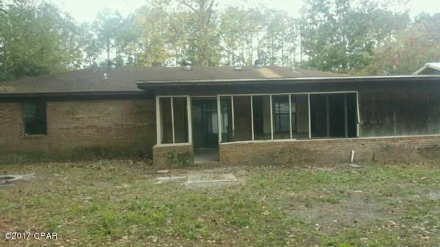 Handyman's Special in a great Lynn Haven neighborhood. Home needs work but is the perfect opportunity to Make it your Own and build equity in it. Located in Pine Forest S/d, this 4 bedroom, 2 bath all brick home sits on a 75x110 lot. Home features 4 bedrooms, 2 baths, family room and framed in patio that could be screened in. Owner will do a 1 year Lease with option (Must be pre-qualified) with the following terms: $139,500 Purchase Price,  $5000 down, $1250 monthly lease with 25% going toward purchase price each month. Call or email today to make an appointment to see this ''diamond in the rough''.Seller is a licensed Florida Real Estate Broker.