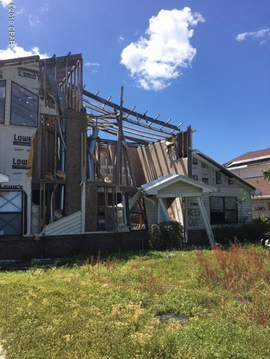 Severe hurricane damage. In need of extensive repair. Investor special! Purchase unit and adjoining unit. Bring all offers.

DO NOT ENTER PROPERTY!





All measurements approx. Buyer to verify.