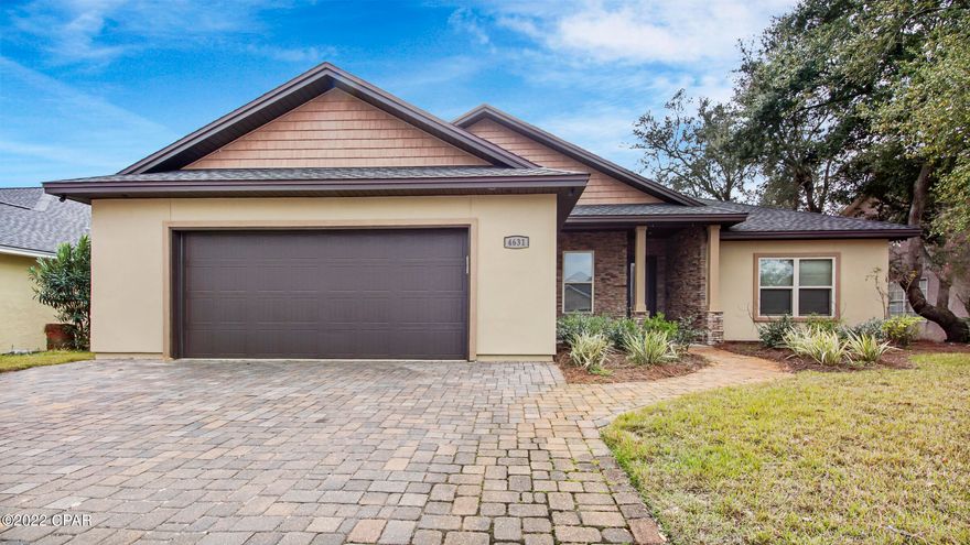 Gorgeous custom built home with all tile floors, designated office, new paint inside & out, tankless water heater, tray ceilings, electric fireplace & separate well for irrigation. You'll love this open floorplan & the character of this home! This house is wired for surround sound & has Smart Home features. There is also Generator Disconnect set up to back-feed power to the electrical panel during loss of power situations. You'll enjoy the granite countertops, stainless steel appliances, & a breakfast bar in the kitchen! The Master Bedroom is large & features a walk-in tile shower, soaker tub, double sinks & double closets! The outside features a large patio & a fenced yard. There is a private shower to get the perfect rinse after a long day at the beach!