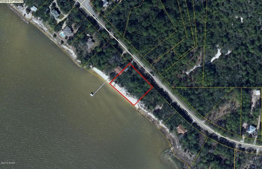 Fisherman's dream!  Beautiful lot on the bay with white sand beach. 235ft on the water and long view of the bay.  Gorgeous sunsets. Old growth oaks. Just minutes away from historic Apalachicola.  Perfect spot to build your dream home or your vacation getaway!